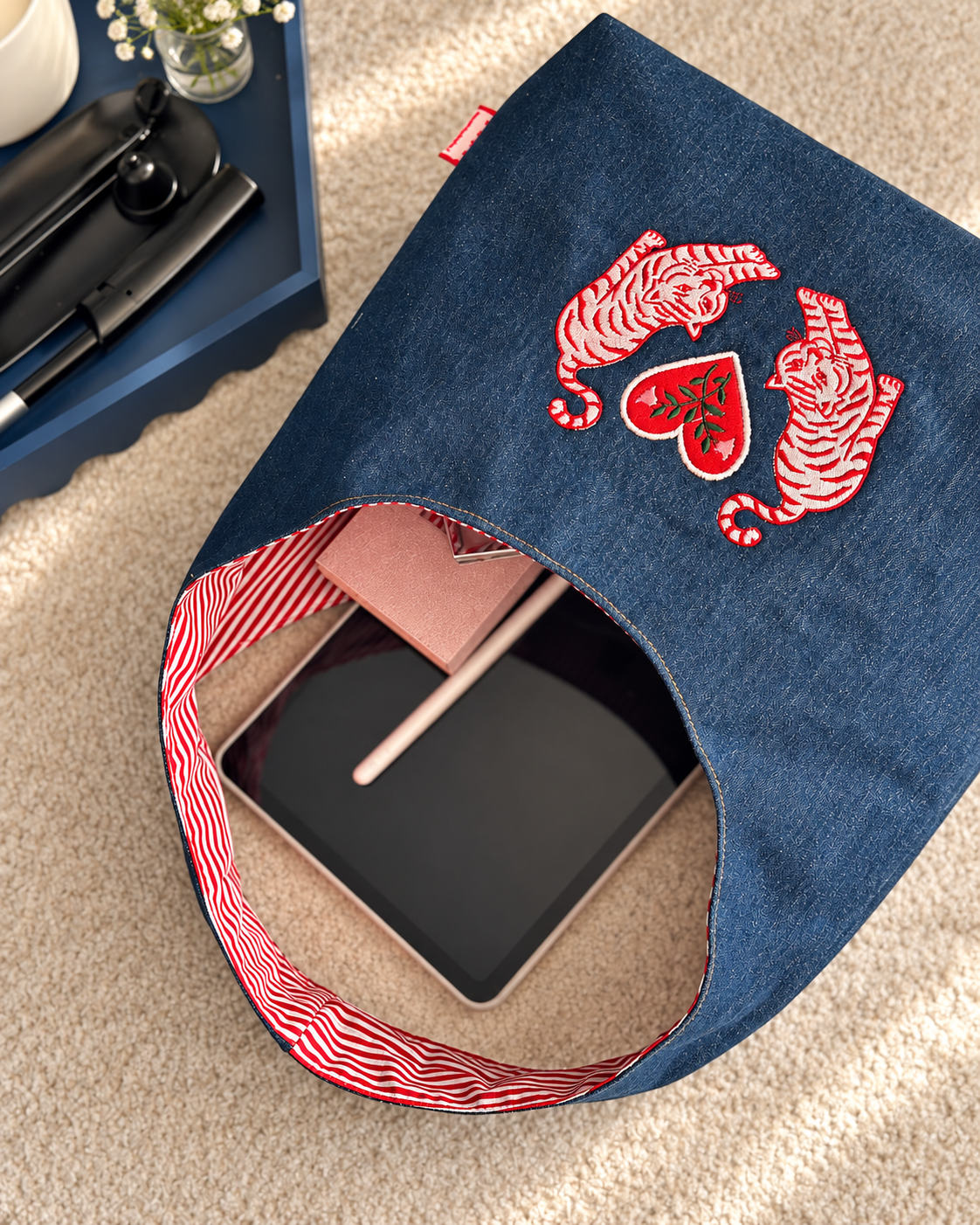 SOHO Tiger Heart hobo bag with everyday essentials, viewed from above